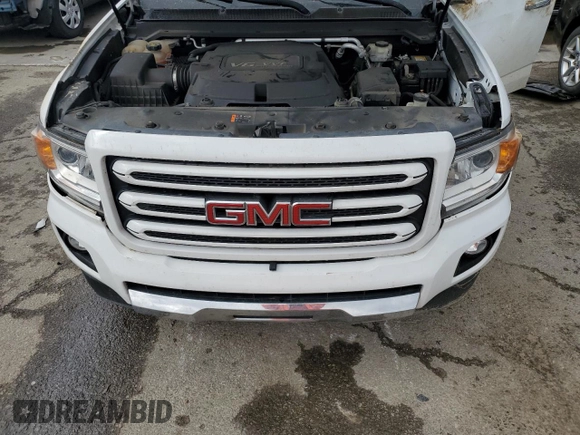 2016 GMC Canyon 4WD SLT z VIN 1GTG6DE35G1371344, wystawiony jako Copart lot #49954915 z przebiegiem 106 345 mil mil oraz Szkody całkowita. Historia ofert i sprzedaży dostępna na DreamBid. Obrazek 12.