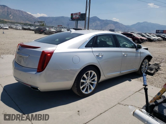 2016 Cadillac XTS Luxury Collection with VIN 2G61N5S35G9197325, listed as a Copart auction lot 55613225 with 131,404 mi miles and Salvage title. Bid and sale history available at DreamBid. Image 3.