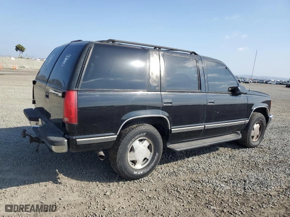 1999 Chevrolet Tahoe Z71 with VIN 1GNEK13R5XJ308924, listed as a Copart auction lot 64463984 with 229,181 mi miles and Salvage Title. Bid and sale history available at carsss.com. Image 3.