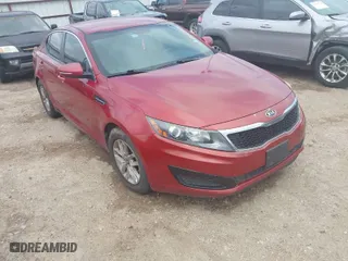 2011 Kia Optima LX with VIN KNAGM4A79B5057807, listed as a IAAI auction lot 42086984 with 133,261 mi miles. Bid and sale history available at carsss.com. Image 1.