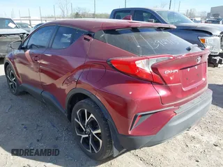2018 Toyota C-HR XLE with VIN NMTKHMBX3JR059057, listed as a IAAI auction lot 41810801 with 124,246 mi miles. Bid and sale history available at carsss.com. Image 3.