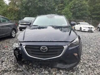 2020 Mazda CX-3 Sport with VIN JM1DKFB73L1470319, listed as a Copart auction lot 65948054 with 34,455 mi miles and Salvage Title. Bid and sale history available at carsss.com. Image 5.