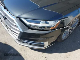 2019 Audi A8 z VIN WAU8DAF83KN006534, wystawiony jako IAAI lot #41712610 z przebiegiem 52 263 mil mil oraz . Historia ofert i sprzedaży dostępna na DreamBid. Obrazek 18.