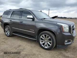 2015 GMC Yukon SLT z VIN 1GKS2BKCXFR269881, wystawiony jako Copart lot #57678175 z przebiegiem 256 703 mil mil oraz Czysty tytuł • Clean title. Historia ofert i sprzedaży dostępna na DreamBid. Obrazek 4.
