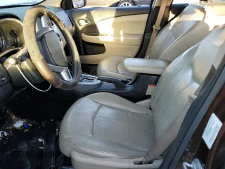 2012 Chrysler 200 Limited with VIN 1C3CCBCB3CN293031, listed as a Copart auction lot 77738704 with 130,398 mi miles and Salvage Title. Bid and sale history available at DreamBid. Image 7.