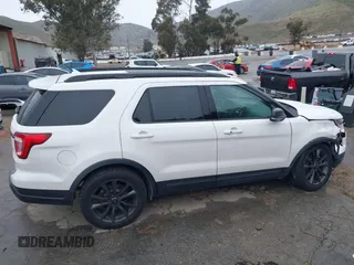 2018 Ford Explorer XLT z VIN 1FM5K7D89JGB09201, wystawiony jako IAAI lot #41796114 z przebiegiem 61 808 mil mil oraz . Historia ofert i sprzedaży dostępna na DreamBid. Obrazek 13.