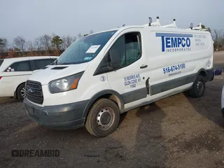 2016 Ford Transit Cargo with VIN 1FTYE9ZM8GKB22179, listed as a IAAI auction lot 41293587 with 105,232 mi miles and . Bid and sale history available at carsss.com. Image 18.