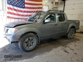 2018 Nissan Frontier PRO-4X with VIN 1N6AD0EV9JN701473, listed as a Copart auction lot 75006604 with 97,110 mi miles and Salvage Title. Bid and sale history available at carsss.com. Image 1.