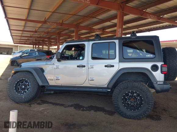 2019 Jeep Wrangler Unlimited Sport S z VIN 1C4HJXDG7KW557682, wystawiony jako IAAI lot #42586742 z przebiegiem 49 741 mil mil oraz . Historia ofert i sprzedaży dostępna na DreamBid. Obrazek 13.