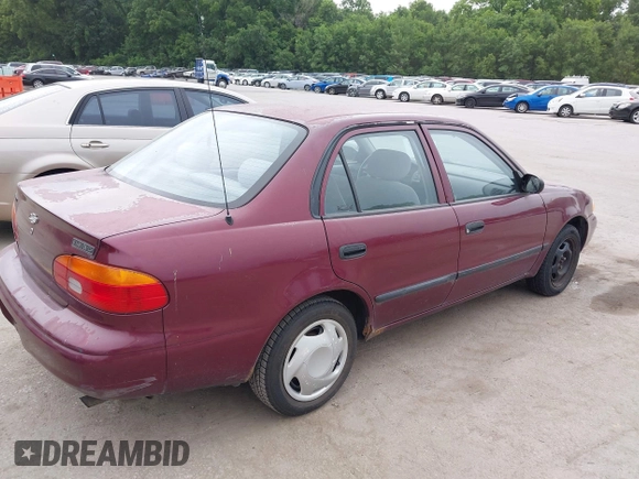 1998 Chevrolet Prizm Lsi z VIN 1Y1SK528XWZ423879, wystawiony jako IAAI lot #42522200 z przebiegiem 171 445 mil mil oraz . Historia ofert i sprzedaży dostępna na DreamBid. Obrazek 4.