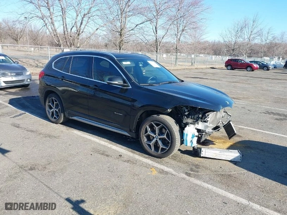2018 BMW X1 xDrive28i with VIN WBXHT3C36J5F91110, listed as a IAAI auction lot 41757293 with 80,327 mi miles. Bid and sale history available at carsss.com. Image 1.