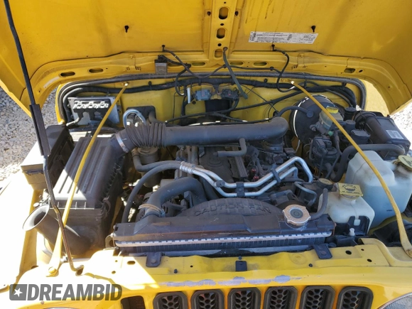 2002 Jeep Wrangler X with VIN 1J4FA39S42P725876, listed as a Copart auction lot 71789864 with 154,991 mi miles and Salvage Title. Bid and sale history available at carsss.com. Image 13.