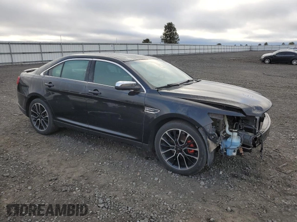 2017 Ford Taurus Limited with VIN 1FAHP2J88HG102721, listed as a Copart auction lot 77889724 with 108,224 mi miles and Salvage Title. Bid and sale history available at DreamBid. Image 4.