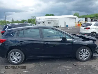 2022 Subaru Impreza z VIN 4S3GTAB6XN3708646, wystawiony jako IAAI lot #42282093 z przebiegiem 16 810 mil mil oraz . Historia ofert i sprzedaży dostępna na DreamBid. Obrazek 13.