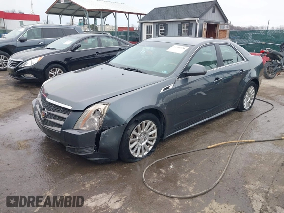 2011 Cadillac CTS Sedan Luxury with VIN 1G6DG5EY7B0163601, listed as a IAAI auction lot 41536256 with 106,523 mi miles. Bid and sale history available at carsss.com. Image 18.