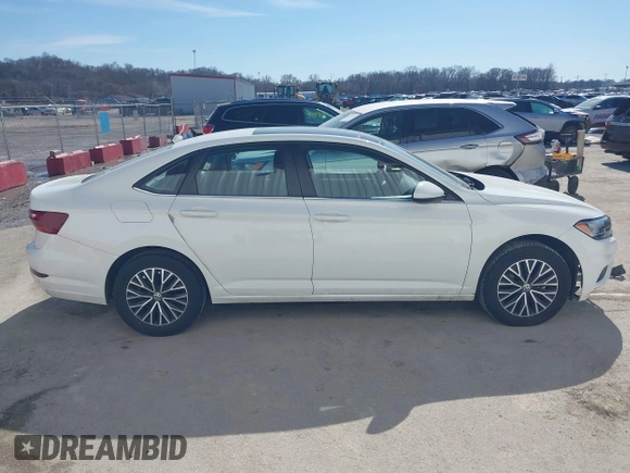 2021 Volkswagen Jetta S z VIN 3VWC57BU0MM070993, wystawiony jako IAAI lot #41650935 z przebiegiem 58 683 mil mil oraz . Historia ofert i sprzedaży dostępna na DreamBid. Obrazek 14.