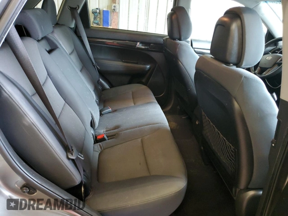 2013 Kia Sorento LX with VIN 5XYKTDA23DG420701, listed as a Copart auction lot 63235625 with 180,322 mi miles and Salvage title. Bid and sale history available at DreamBid. Image 11.