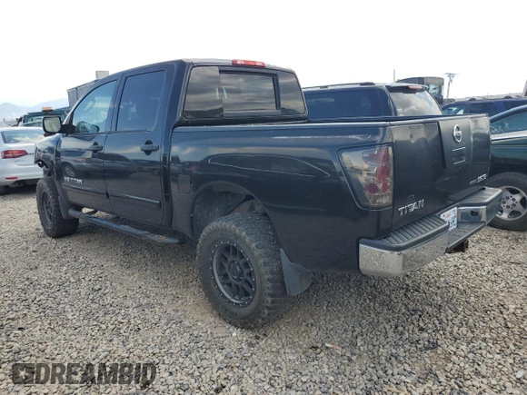 2010 Nissan Titan XE with VIN 1N6BA0EJ5AN318639, listed as a Copart auction lot 69776984 with 158,913 mi miles and Salvage Title. Bid and sale history available at carsss.com. Image 2.