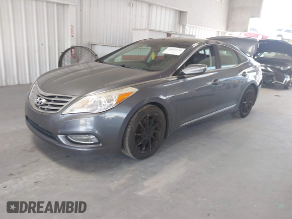 2013 Hyundai Azera with VIN KMHFH4JG3DA213459, listed as a IAAI auction lot 42642239 with 130,195 mi miles and . Bid and sale history available at DreamBid. Image 2.