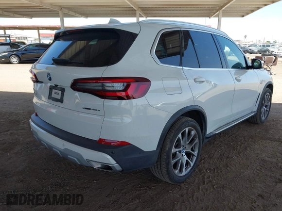 2023 BMW X5 xDrive45e z VIN 5UXTA6C08P9P19395, wystawiony jako IAAI lot #42272149 z przebiegiem 3 281 mil mil oraz . Historia ofert i sprzedaży dostępna na DreamBid. Obrazek 4.