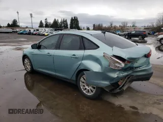 2012 Ford Focus SE with VIN 1FAHP3F21CL142407, listed as a Copart auction lot 48551205 with 174,935 mi miles and Salvage Title. Bid and sale history available at carsss.com. Image 2.