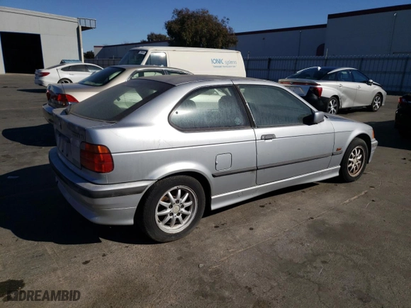 1996 BMW 3-Series 318TI with VIN WBACG7323TAS97033, listed as a Copart auction lot 76818284 with 208,412 mi miles and Clean Title. Bid and sale history available at carsss.com. Image 3.
