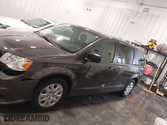 2019 Dodge Grand Caravan SE with VIN 2C4RDGBG9KR527770, listed as a IAAI auction lot 41571473 with 101,310 mi miles and . Bid and sale history available at DreamBid. Image 15.