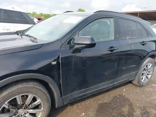 2019 Cadillac XT4 AWD Sport with VIN 1GYFZFR40KF111912, listed as a IAAI auction lot 42375992 with 98,006 mi miles and . Bid and sale history available at DreamBid. Image 14.