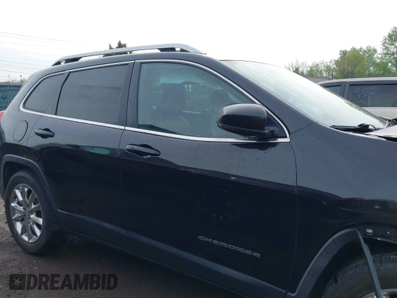 2015 Jeep Cherokee Limited z VIN 1C4PJMDS6FW634434, wystawiony jako IAAI lot #42182704 z przebiegiem 161 987 mil mil oraz . Historia ofert i sprzedaży dostępna na DreamBid. Obrazek 14.