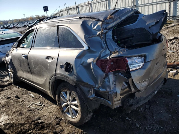 2017 Kia Sorento LX z VIN 5XYPG4A35HG265402, wystawiony jako Copart lot #79926994 z przebiegiem Nie podano mil oraz Szkoda całkowita • Salvage title. Historia ofert i sprzedaży dostępna na DreamBid. Obrazek 2.