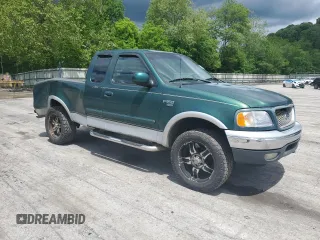 1999 Ford F-150 with VIN 1FTRX18W8XNB82710, listed as a Copart auction lot 58264745 with Not provided miles and Salvage title. Bid and sale history available at DreamBid. Image 4.