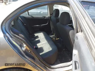 2010 Mitsubishi Lancer DE with VIN JA32U1FU1AU033241, listed as a IAAI auction lot 41805976 with 214,606 mi miles. Bid and sale history available at carsss.com. Image 8.