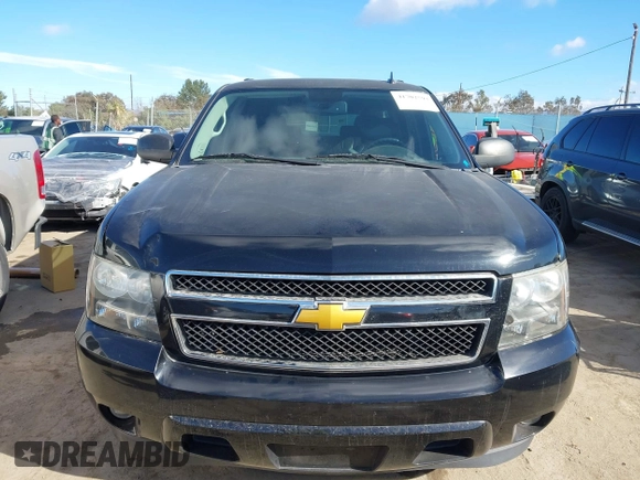 2014 Chevrolet Suburban LT with VIN 1GNSCJE08ER240230, listed as a IAAI auction lot 41702593 with 140,190 mi miles. Bid and sale history available at carsss.com. Image 12.