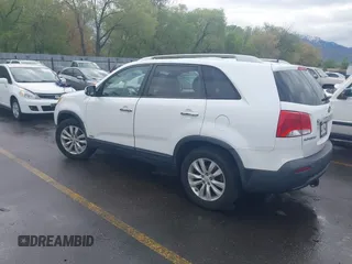 2011 Kia Sorento LX with VIN 5XYKTDA23BG060231, listed as a IAAI auction lot 42142538 with 166,884 mi miles. Bid and sale history available at carsss.com. Image 3.