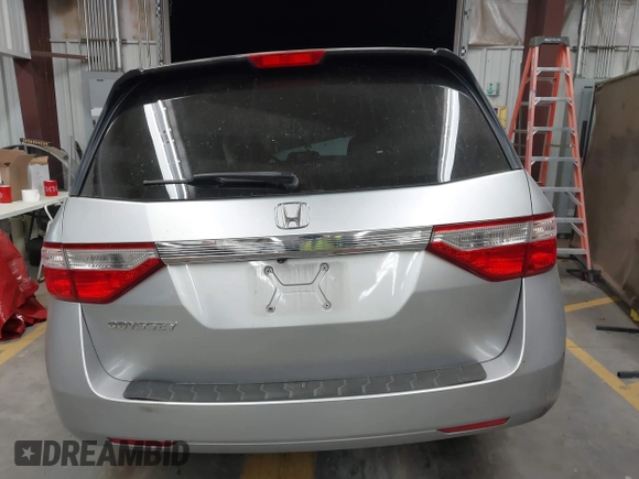 2011 Honda Odyssey EX-L with VIN 5FNRL5H62BB083682, listed as a IAAI auction lot 41425267 with 169,166 mi miles and . Bid and sale history available at carsss.com. Image 15.