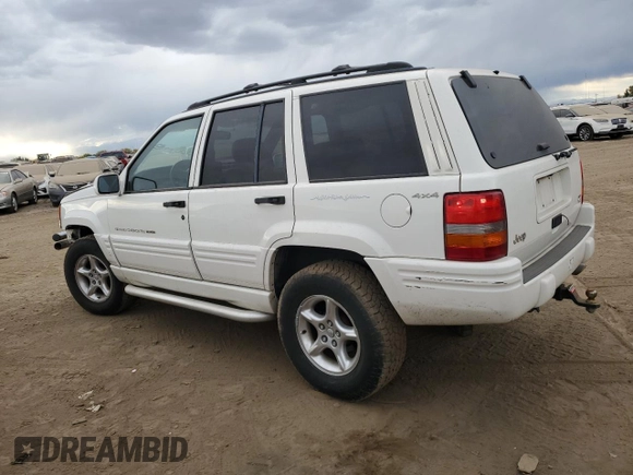 1998 Jeep Grand Cherokee Limited with VIN 1J4GZ88Z4WC164505, listed as a Copart auction lot 76843304 with 0 mi miles and Salvage Title. Bid and sale history available at carsss.com. Image 2.