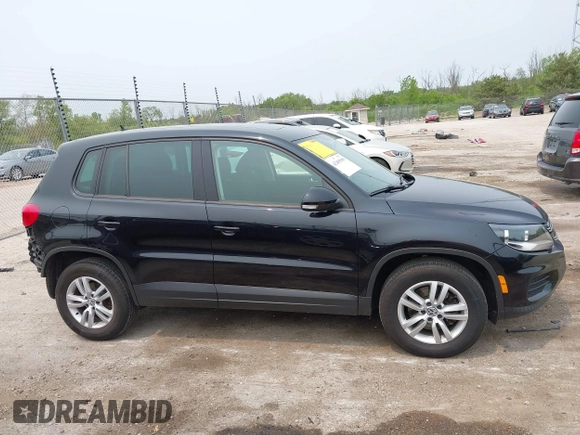 2013 Volkswagen Tiguan S with VIN WVGAV3AX2DW594334, listed as a IAAI auction lot 42405989 with 96,559 mi miles and . Bid and sale history available at DreamBid. Image 13.