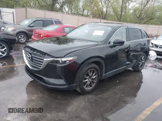 2016 Mazda CX-9 Touring with VIN JM3TCBCY5G0101490, listed as a IAAI auction lot 42062846 with 85,352 mi miles and . Bid and sale history available at DreamBid. Image 2.