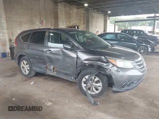 2014 Honda CR-V EX with VIN 2HKRM4H52EH719148, listed as a IAAI auction lot 40448916 with 145,765 mi miles and . Bid and sale history available at DreamBid. Image 1.