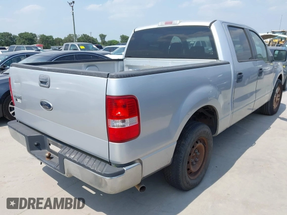 2005 Ford F-150 XLT with VIN 1FTRW12W15FA37754, listed as a IAAI auction lot 42276475 with 218,332 mi miles and . Bid and sale history available at DreamBid. Image 4.