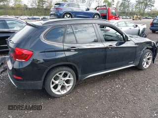 2013 BMW X1 xDrive28i z VIN WBAVL1C56DVR88949, wystawiony jako IAAI lot #42152710 z przebiegiem 93 136 mil mil oraz . Historia ofert i sprzedaży dostępna na DreamBid. Obrazek 4.