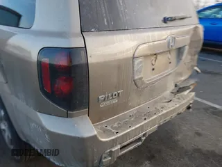 2007 Honda Pilot EX-L with VIN 2HKYF18667H509331, listed as a IAAI auction lot 41453510 with 228,746 mi miles and . Bid and sale history available at DreamBid. Image 6.