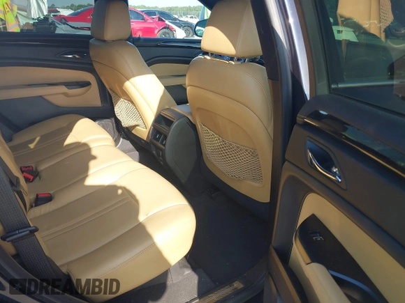 2014 Cadillac SRX Performance Collection with VIN 3GYFNCE39ES613051, listed as a IAAI auction lot 42113063 with 82,952 mi miles and . Bid and sale history available at carsss.com. Image 8.