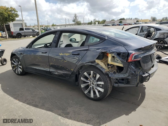 2024 Tesla Model 3 Long Range with VIN 5YJ3E1EB8RF868583, listed as a Copart auction lot 44813275 with 6,805 mi miles and Salvage Title. Bid and sale history available at carsss.com. Image 2.