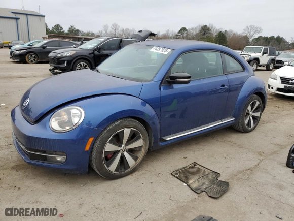 2012 Volkswagen Beetle 2.0T Turbo w/Sun/Sound with VIN 3VWV67AT1CM666305, listed as a Copart auction lot 44397525 with 80,523 mi miles and Clean Title. Bid and sale history available at carsss.com. Image 1.