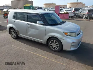 2014 Scion xB with VIN JTLZE4FE1EJ061978, listed as a IAAI auction lot 41937298 with 112,376 mi miles. Bid and sale history available at carsss.com. Image 1.