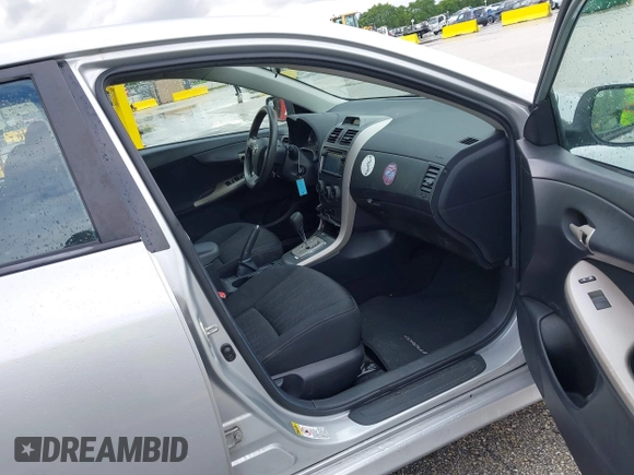 2013 Toyota Corolla L with VIN 5YFBU4EE7DP209207, listed as a IAAI auction lot 41990086 with 168,269 mi miles. Bid and sale history available at carsss.com. Image 5.