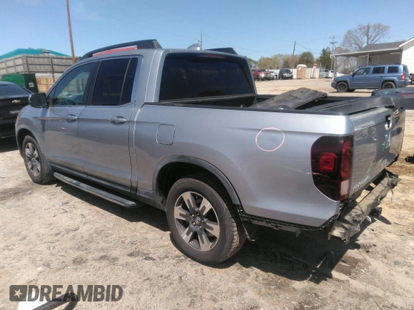 2017 Honda Ridgeline RTL with VIN 5FPYK2F58HB005608, listed as a IAAI auction lot 41934772 with 78,165 mi miles and . Bid and sale history available at DreamBid. Image 3.