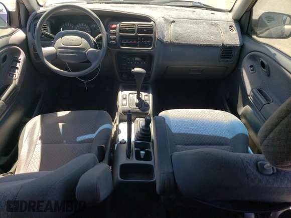 2002 Chevrolet Tracker z VIN 2CNBJ13C026951435, wystawiony jako Copart lot #57782784 z przebiegiem 132 279 mil mil oraz Szkoda całkowita • Salvage title. Historia ofert i sprzedaży dostępna na DreamBid. Obrazek 8.