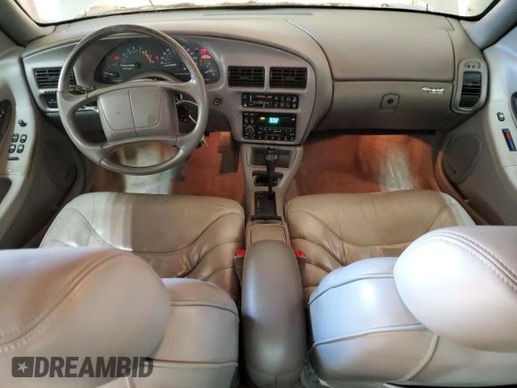 1996 Buick Regal Custom with VIN 2G4WB52KXT1523059, listed as a Copart auction lot 88440285 with 95,444 mi miles and Salvage title. Bid and sale history available at DreamBid. Image 8.